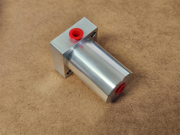 Close-up image of the Buyers Products HV25CYL air cylinder, showing its compact, cylindrical housing and mounting bolt holes—designed for seamless integration into the HV25 valve setup.