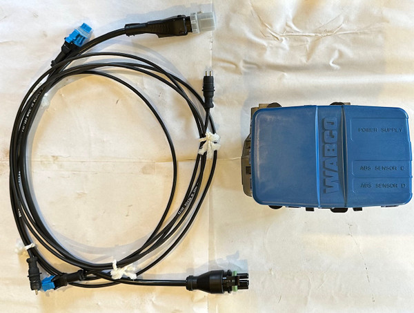 Sealco i21110 trailer ABS ECU valve kit with 2S/1M ABS controller, power cable, and sensor extension cables.