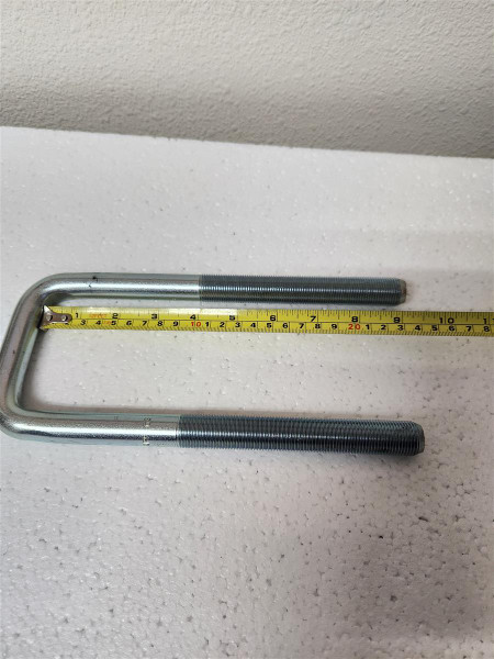 Zinc plated square bend U-bolt with 3/4 inch diameter, 9 inch legs, and included nuts and washers for trailer and flatbed mounting applications.