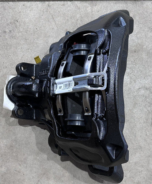 Left-hand air disc brake caliper assembly with pads and hardware for Ridewell 20K and 23K axle systems commonly used on Neustar trailers.