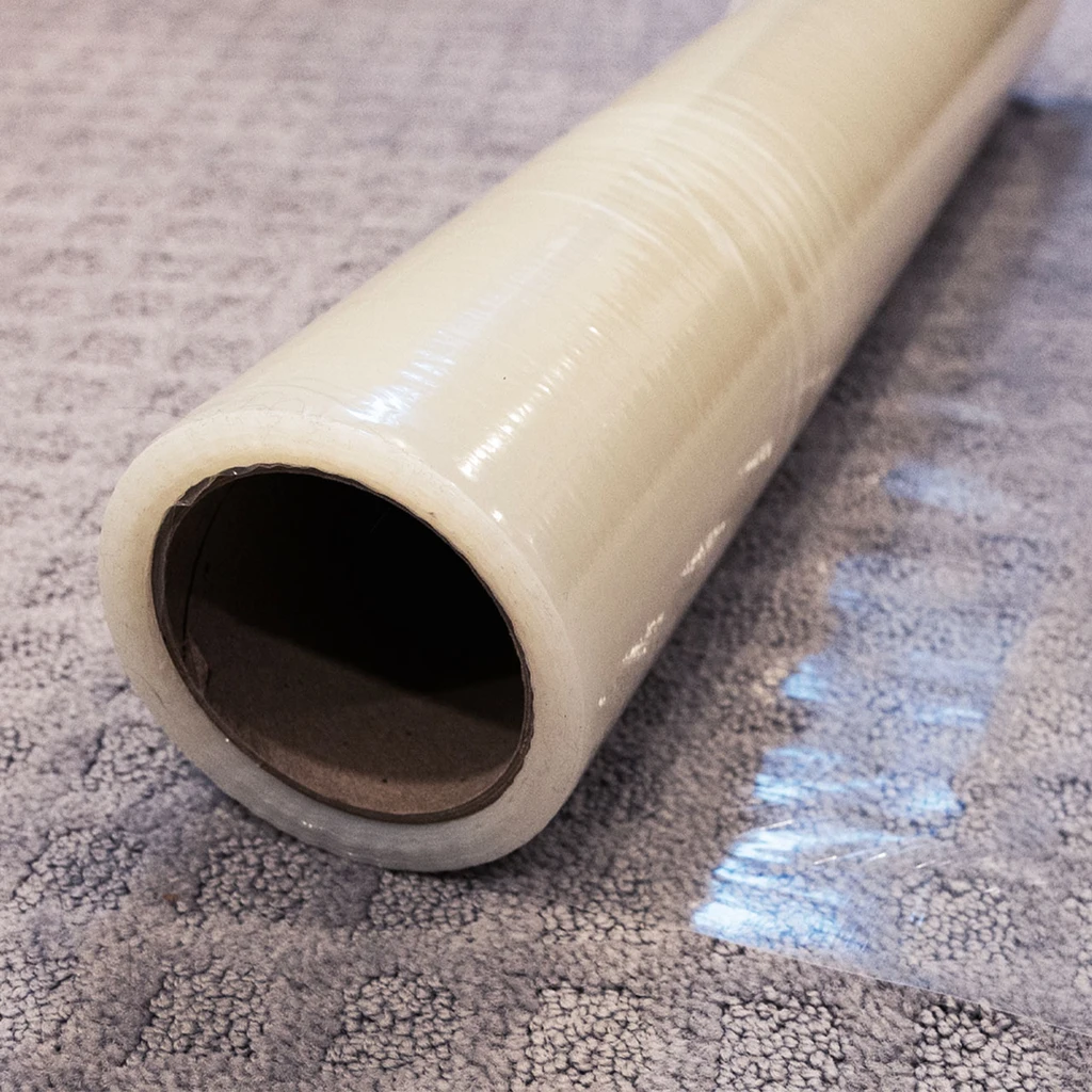 24" - Carpet Protection Self-Adhesive Film, 2.5 Mil.,  200' Roll - Warrior Protective - clear
