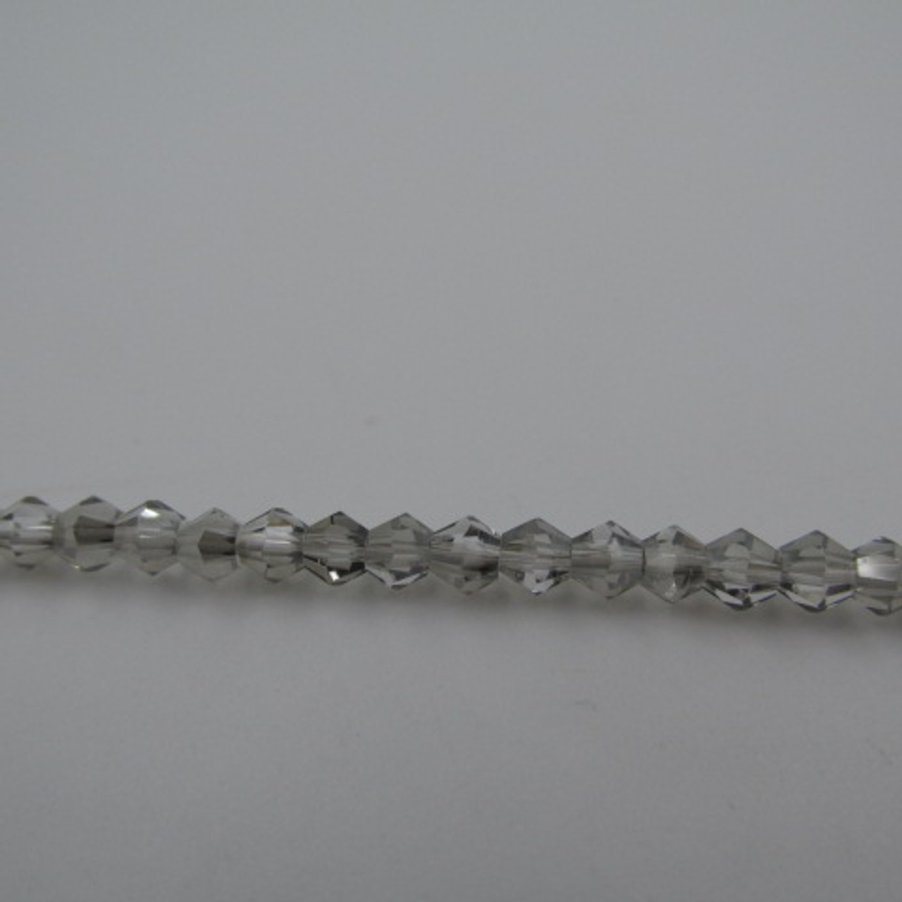 4mm Silver Grey Thunder Polish Crystal Bicones (144pk) 4BI37