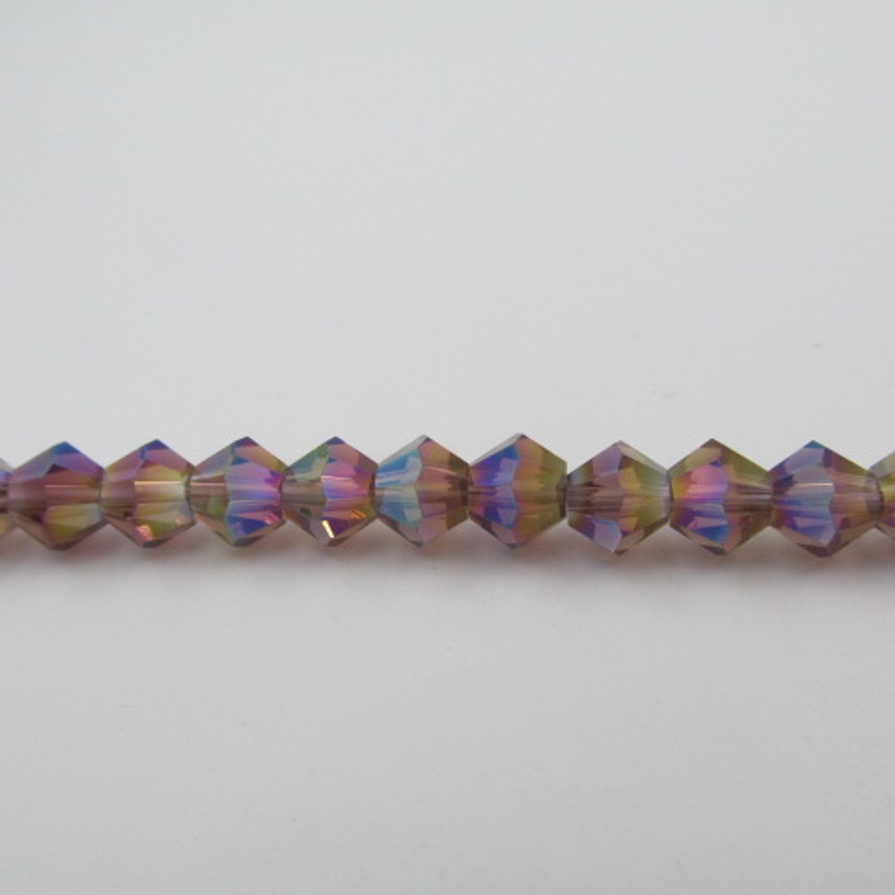 Medium Amethyst AB 6mm Thunder Polish Bicone Crystals #10AB Medium Amethyst AB 6mm Thunder Polish Bicone Crystals #10AB