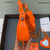 Balenciaga 700940210 Women's Neo Cagole XS Handbag in Orange Arena lambskin