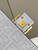Fendi 8BR600 Baguette FF White Glazed Fabric Bag With Inlay
