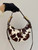 Prada  Arqué printed leather mini shoulder bag 1BC194 Honey White