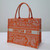 Dior M1296 Book Tote Medium Neon Orange Toile de Jouy Reverse Embroidery
