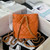 Chanel AS3947 Small Backpack Lambski & Gold-Tone Metal Orange