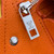 LV M57081 Louis Vuitton Takeoff Slingbag Orange