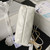 Chanel 22 Mini Handbag AS3980 Shiny Calfskin & Gold-Tone Metal White