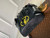 LV M41079 Louis Vuitton Christopher MM Epi Black With Yellow Logo