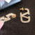 Valentino VLOGO SIGNATURE EARRINGS IN METAL AND SWAROVSKI CRYSTALS WJ0G04YCW_MH5