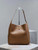 YSL 753837 Le 5 À 7 Supple Large In Smooth Leather Brown