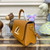 LV M22229 Louis Vuitton Twist MM Handbag Honey Gold