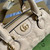 Gucci 702251 GG matelassé leather top handle bag Beige