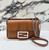 Fendi 8BS017 Baguette Mini Brown Selleria bag with 309 hand-sewn Tpstitches 8610S