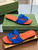 Gucci 694451 Women's Interlocking G cut-out slide sandal G66766