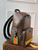 LV M57965 Louis Vuitton Discovery Backpack Monogram