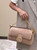 Fendi 8BR600 Baguette Medium Re-Edition bag in Pink lamé sheepskin