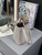 Loewe AANBBBMX01 Mini Pebble Bucket Bag in mellow calfskin Pearl gray