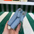 Prada 1NR015 Embellished satin and leather mini-pouch Blue