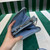 Prada 1NR015 Embellished satin and leather mini-pouch Blue