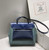 Hermes H084076CKAD Herbag Zip 31 Bag in Black Hunter Leather and Canvas H60057