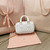 MiuMiu 5BP077 Matelassé nappa leather top-handle mini-bag White