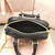 MiuMiu 5BP077 Matelassé nappa leather top-handle mini-bag Black