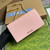 Gucci 772643 Chain Wallet With Gucci Script Light pink