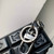 LV M01478 Louis Vuitton LV Chocolate Bar Figurine Key Holder and Bag Charm Black grid