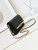 Chanel 23K AS4452 Flap Bag Lambskin With Pearl & Metal Chain Black