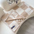 LV Avalon Rocabar Louis Vuitton Checkmate Blanket M77861