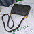 Bottega Veneta BV 666870 Cassette Intreccio grained leather cross-body bag Black