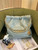 Chanel 22 AS3260 Small Handbag Shiny Calfskin Light Green Gold