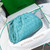 BV 585852 Bottega Veneta Mini Pouch intrecciato leather clutch with strap Blue