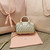 MiuMiu 5BP077 Matelassé nappa leather top-handle mini-bag Pyrite