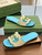 Gucci 694451 Women's Interlocking G cut-out slide sandal G66765