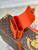 LV M81525 Louis Vuitton S-LOCK Vertical Wearable Wallet Orange
