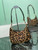 Prada 1BC204 Prada Re-Edition printed leather mini-bag Honey