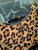 Prada 1BC204 Prada Re-Edition printed leather mini-bag Honey