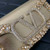 Valentino 5W2B0N86NKG_ZF7 Valentino Garavani Locò Small Embroidered Shoulder Bag Gold
