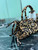 Prada 1BA486 Bonnie printed  leather mini handbag Leopard