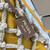 Prada Noué medium cotton macramé bag 1BC111 Yellow