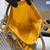 Prada Noué medium cotton macramé bag 1BC111 Yellow