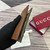 Gucci 818953 GG Emblem bi-fold embossed card case Brown