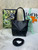 Loewe Mini Puzzle Fold tote in shiny calfskin A657V25X01 Black