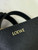 Loewe Mini Puzzle Fold tote in shiny calfskin A657V25X01 Black