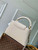 LV M12938 Louis Vuitton Capucines MM Handbag Quartz White