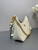 Prada Re-Edition leather mini-bag 1BC204 Beige